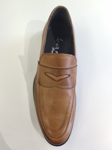 Sapatos em pele